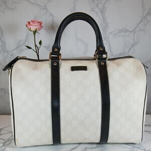 Gucci White GG Supreme Canvas Joy Bag with Black Leather Trim.